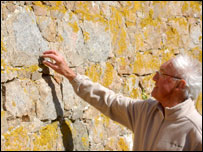 Geologist looking at granite