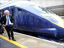 Boris Johnson standing at a train platform
