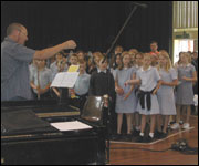 Barry conducting the children