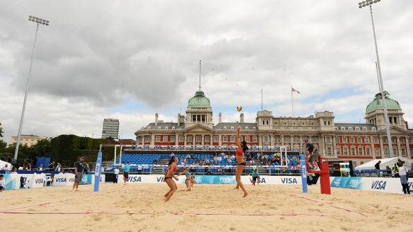 Olympic test events such as the Beach Volleyball International tournament at Horse Guards Parade are going ahead despite the rioting in London. Photo: AP