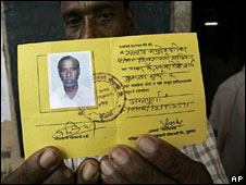 Indian fisherman with his local ID card