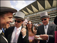 Royal Enclosure race goers in their traditional morning dress.