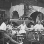 Piri, Freda Stanleigh, Mrs. X, Basil Stanleigh, Mr. X -- drinks in our garden after a game of badminton. It is in fact Basil's lagonda in right background, but it looks just like Piri's! [K.L. 1940]