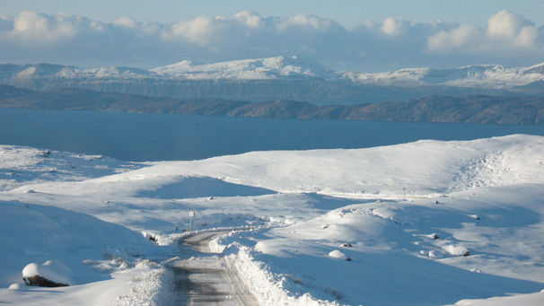 The high road to Applecross between snowfields