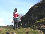 Julie McElroy using walking poles on 'The Whangie'