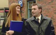 Ray flirts with the estate agent.