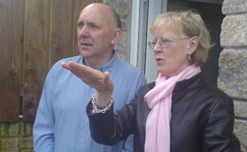 Ken and Cherrie survey the garden.