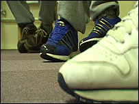 The prisoners shoes as they write