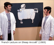John Cleese and Michael Palin in the sketch 'French Lecture on Sheep Aircraft' taken from Monty Python's Flying Circus Series 1, Episode 2 - Sex and Violence (recorded 30 August 1969; aired 12 October 1969)