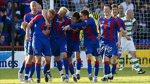 Inverness players celebrate after scoring a goal against Celtic