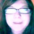 Katie listening whilst studying