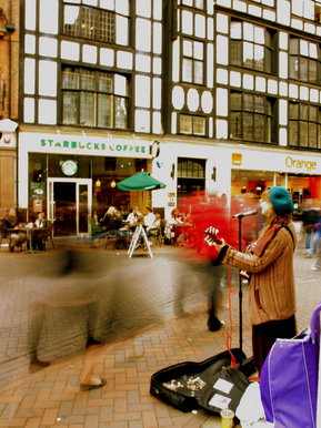 Busker at rush hour (2009)