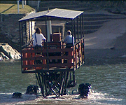 Neil catches a lift in the sea tractor to get across to Burgh Island