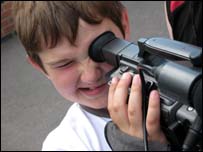 Boy with video camera