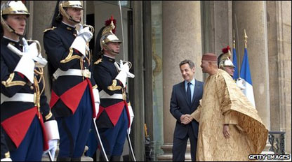 French President Nicolas Sarkozy greets his Malian counterpart Amadou Toumani Toure prior to a meeting at the Elysee Palace in Paris