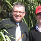 Jim Bradley in his garden centre with son Peter. Note the appropriate hat