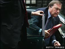 John Prescott gets out of a ministerial car