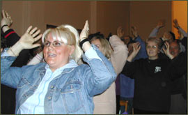 "If you're happy and you know it, raise your hands!"