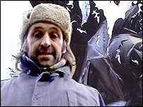 Simon Packard stands in front of his sculpture, Shenzhou