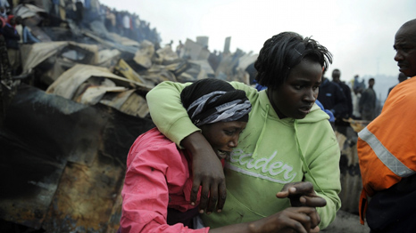 People caught up in the explosion (AFP)