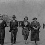 This is a photograph of my parents, Robert and Maud Beesley, together with my sister, Rose and a shipmate of mine that was in the Navy, Walter Brewer. It was taken walking along the front at Weymouth. The date of the photograph is September 1937