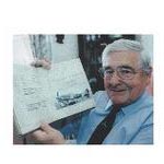 R A Smith 1999 with his pilots log and photo of his beloved Typhoon