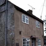 This is the cottage in Somerset where I spent a lot of the war, still there in 1991 when I took this picture. The water pump too was still there across the road!