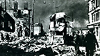 Black and white view of air raid destruction to Dumbarton Road in Dalmuir.
