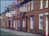Street with houses up for sale