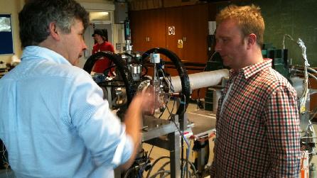 Mike Charlton shows Adam the positron beam