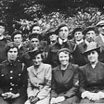 Reverend Storer with the church parade. Mabel Ulliot is seated at the centre of the front row