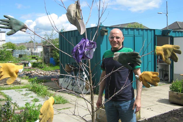 Gloves drying in a tree