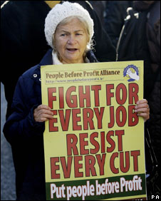 A woman protests against the cuts in Dublin, 24 November 