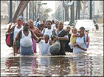 Evacuees in New Orleans. Photo (c) AP