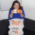 Jodie inspects the all new 'Thank you' mugs and tea towels...