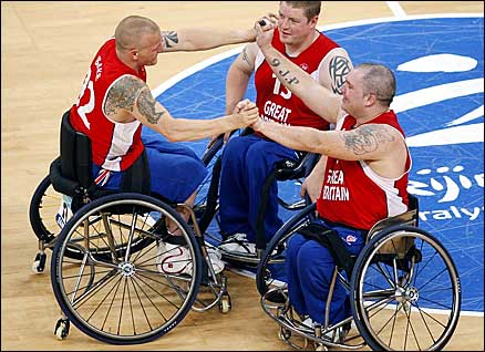 (l-r) Great Britain's Andrew Blake, Peter Finbow, and Jon Pollock celebrate winning wheelchair basketball bronze