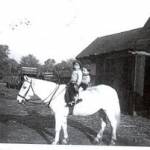 Julie Andrews and John riding Trixie