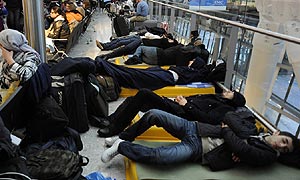 People sleeping at Heathrow airport