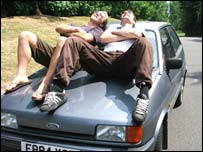 The lads on top of the car