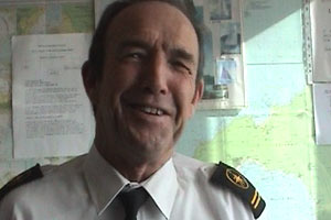 Roy keeps a close eye on the sea to check for any changes in weather conditions.