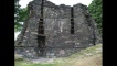 Balla air taobh a-muigh broch Cruithneach ann an Gleann Eilg