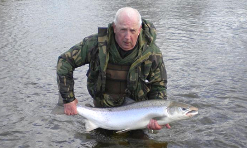 Local fisherman with a recent 30lb salmon.