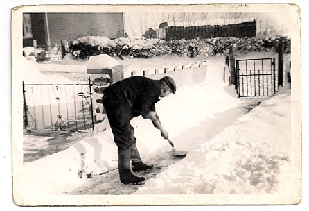 My father clearing our drive in Brynaman, 1963