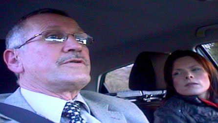 Bruce Boe in a car with Rachel Treadaway-Williams