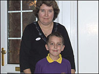 Sue Stainer and son Jack (10) outside their house