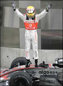 Lewis Hamilton celebrates his latest success at Indianapolis