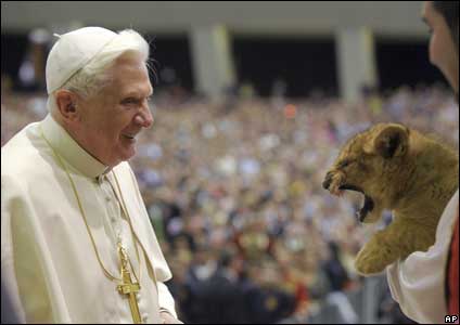 Pope Benedict XVI with a lion cub