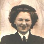 Jenny Davies in her uniform and HMS Drake hat.