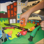 Models being placed on the set