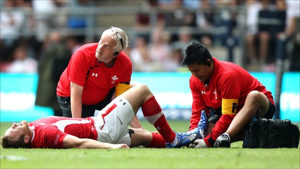 Morgan Stoddart receiving medical attention.